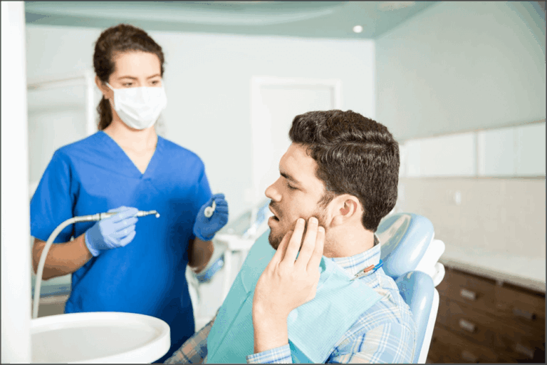 Emergency dentist near me in Ubud – patient receiving urgent dental treatment at Nusa Medica Dental Care with professional dentist assistance.